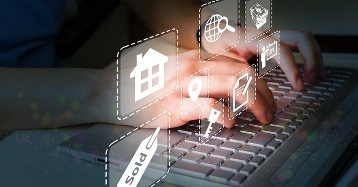 Agent using a laptop for property sales and listings