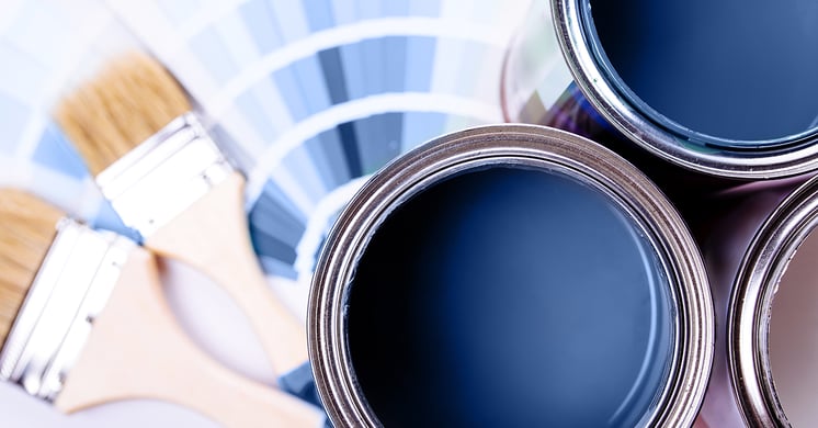 Blue paint and brushes