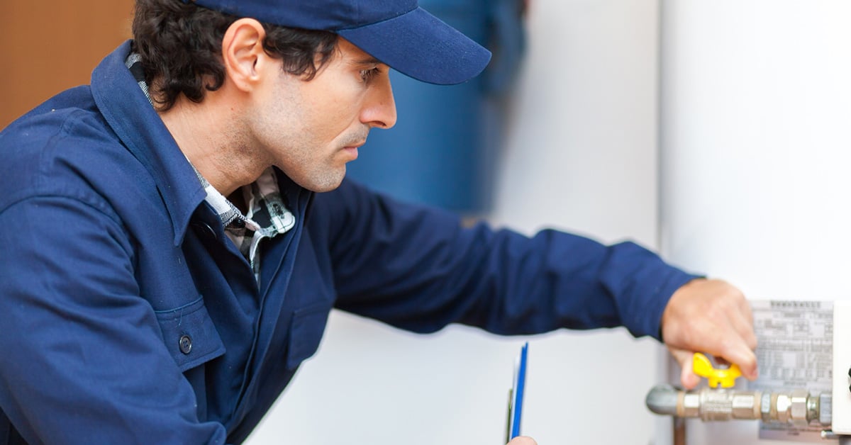 Contractor Fixing Water Heater